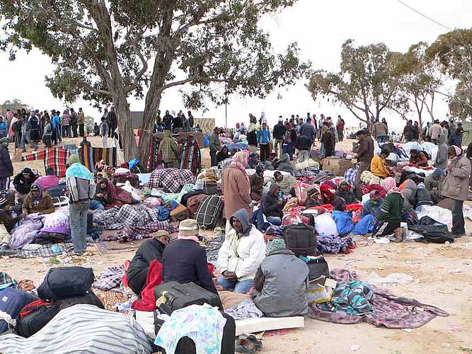 Vor dem Weltflüchtlingstag haben Hilfsorganisationen einen nationalen Aktionsplan gefordert. Im Bild ein Flüchtlingslager in Tunesien. Foto: wikimedia/Mohamed Ali Mhenni